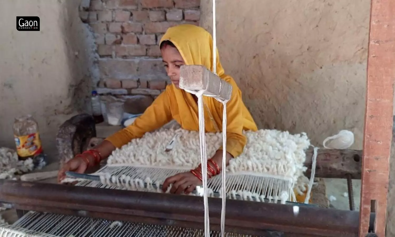 ‘I am paid Rs 14 for weaving two feet of carpet’