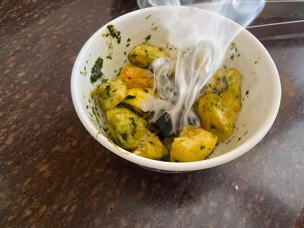 The chaat made with kimb smoked with a combination of mustard oil poured over a burning coal.