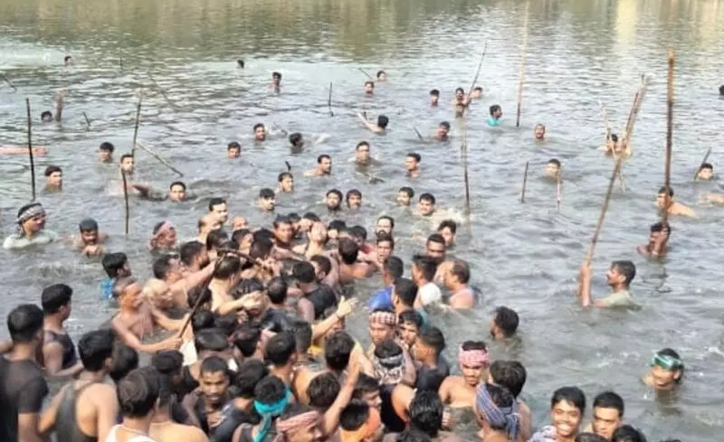 Almost 15,000 devotees thronged the local Narayan temple on the occasion of Odia new year to observe the ritual of worshipping the idol.