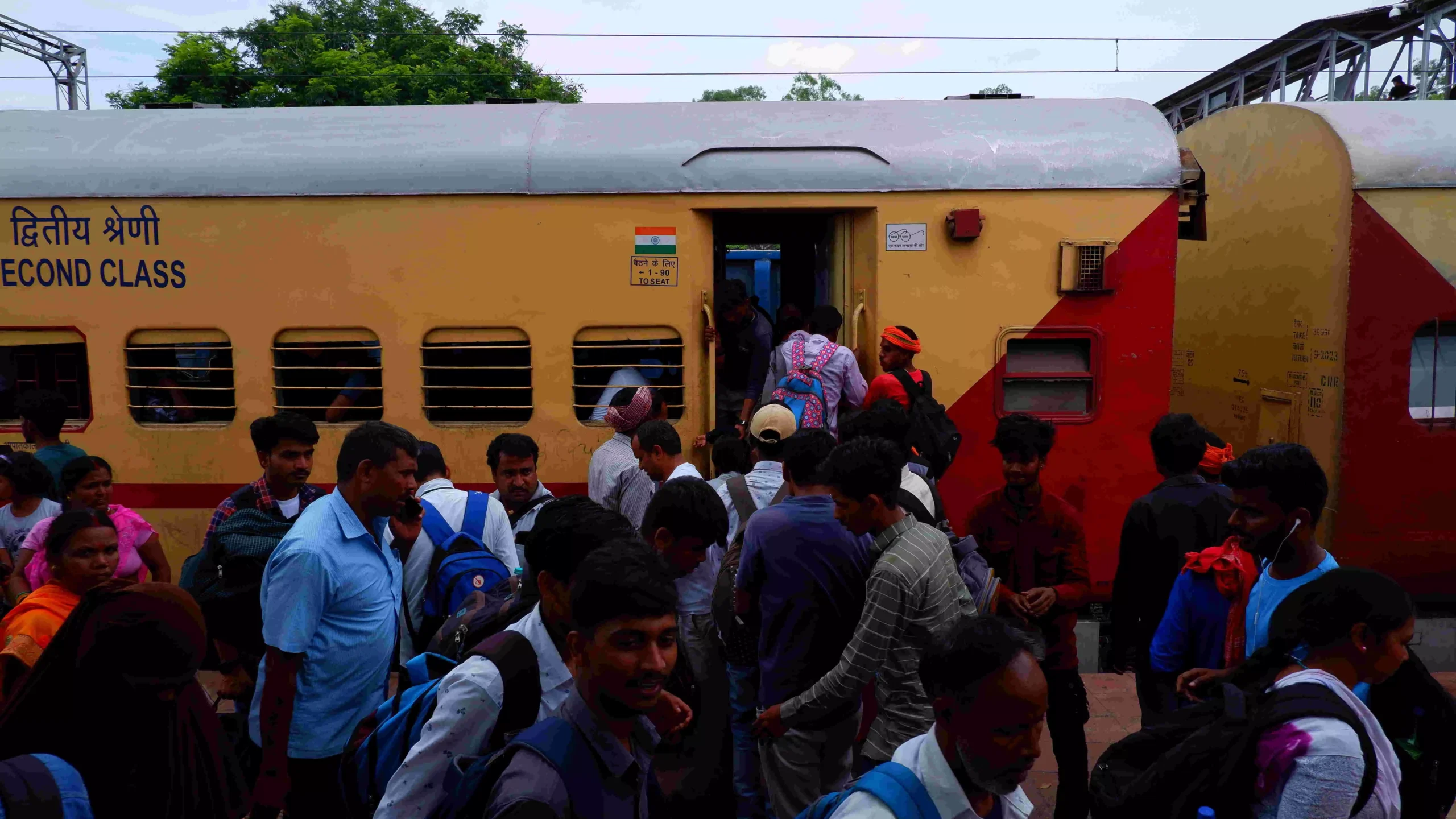 Migrant workers from Palmu board their train to Sasaram, Bihar. Migrant workers from Palmu board their train to Sasaram, Bihar.