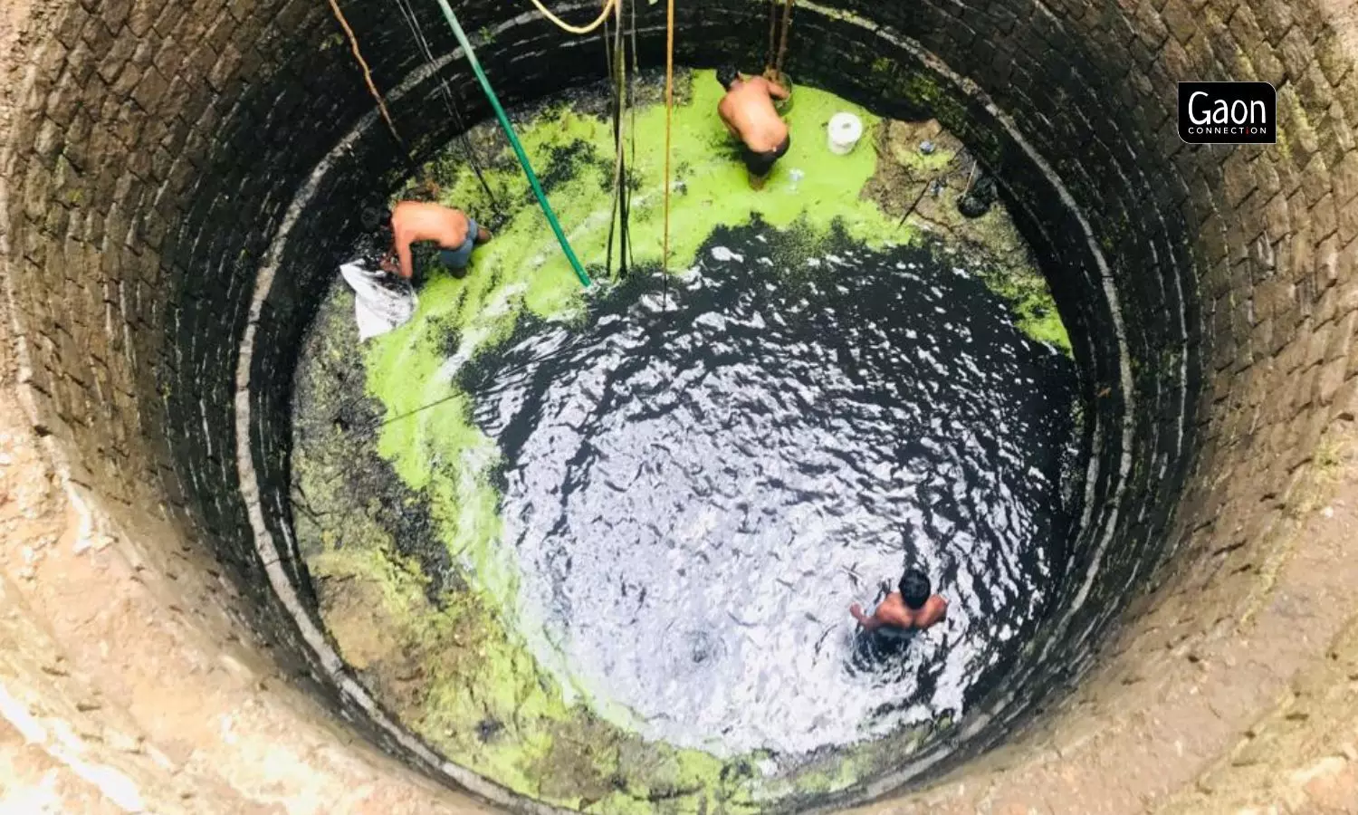 Well-warriors stood inside the 60-feet deep well, in their undergarments, removing silt and waste from the giant well, which once was the sole source of water for the washermans community at the dhobi ghat. Well-warriors stood inside the 60-feet deep well, in their undergarments, removing silt and waste from the giant well, which once was the sole source of water for the washermans community at the dhobi ghat.