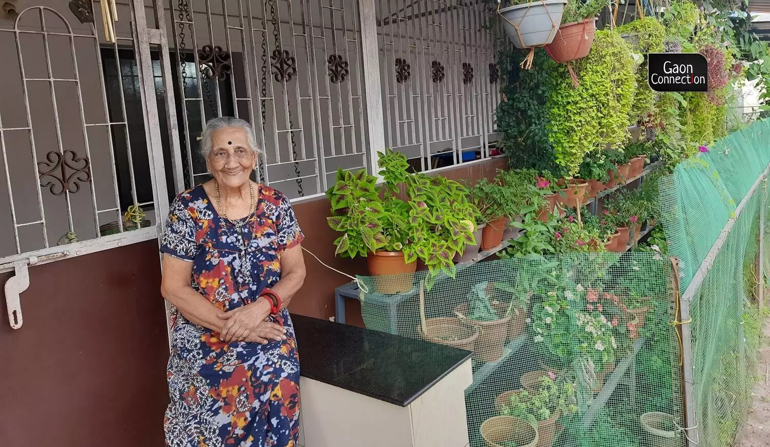 Subbalakshmi Narayan is 94 years old. She is from Kalpathy and has lived a big part of her life in Mumbai. Flowerpots on shelves and hanging from the eves of her roof are bursting with flowers. She enjoys singing, she said. Subbalakshmi Narayan is 94 years old. She is from Kalpathy and has lived a big part of her life in Mumbai. Flowerpots on shelves and hanging from the eves of her roof are bursting with flowers. She enjoys singing, she said.