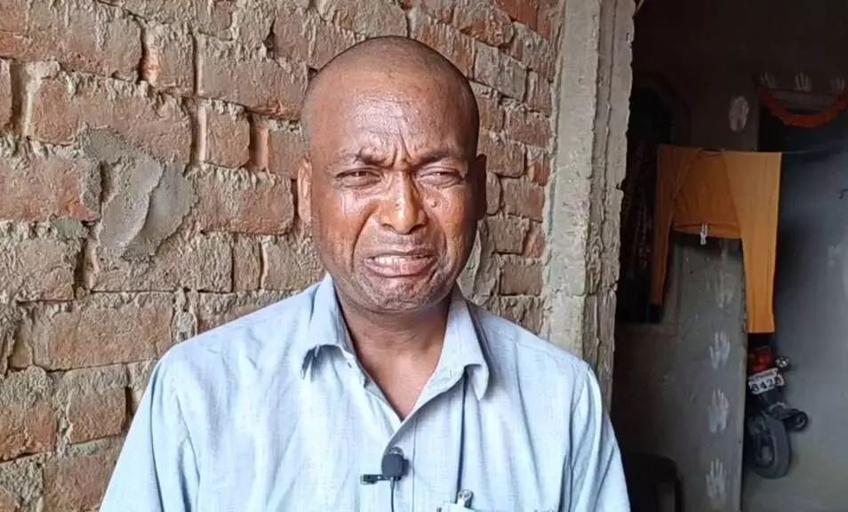 Joginder Nath, a 42-year-old grocery store owner in Tikadevri village of Ballia, who lost his mother on June 16. Joginder Nath, a 42-year-old grocery store owner in Tikadevri village of Ballia, who lost his mother on June 16.