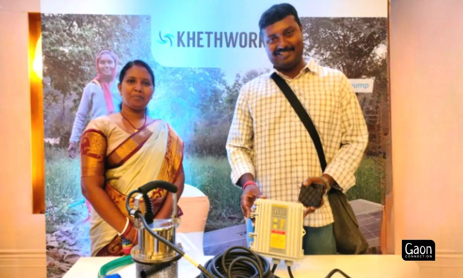 Akli Tudu(left) and Durga Dayal Patra(right) displaying the micro solar pump. Photo by Aishwarya Tripathi. Akli Tudu(left) and Durga Dayal Patra(right) displaying the micro solar pump. Photo by Aishwarya Tripathi.