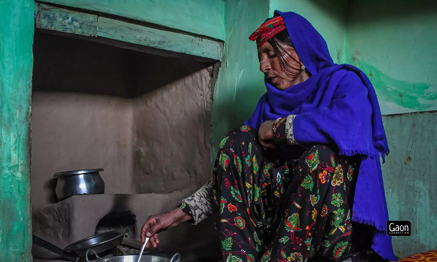 Here the Dai is busy making tea on a clay stove. Here the Dai is busy making tea on a clay stove.