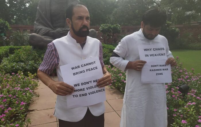 Rajya Sabha MP Nazir Ahmad Laway and Mir Mohammad Fayaz protest in Parliament premises on Monday over the situation in Kashmir. Pic: ANI